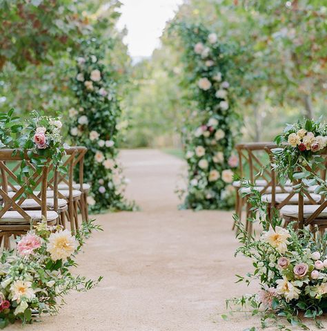 A lush arbor decorated with blooms makes my heart so happy. I think it’s so beautiful when a bride gets to walk down the aisle surrounded by greenery and florals! #detailedtouchevents  • Photographer: @marielhannah | Creative Direction & Styling: @detailedtouchevents | Floral: @emilyreynoldsdesign | Location: @kestrelpark |Rentals: @partypleasers Flower Lined Aisle Wedding, Wedding Planning Checklist Detailed, Wedding Arbors, Ceremony Aisle, Aisle Flowers, Walk Down The Aisle, Winter Wedding Flowers, Unique Wedding Flowers, Wedding Ceremony Flowers