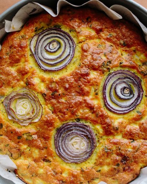 Yotam Ottolenghi's Cauliflower Cake | Kitchn Cauliflower Cake, Cauliflower Cakes, Zucchini Parmesan, Ottolenghi Recipes, Baked Zucchini, Parmesan Crisps, Turmeric Recipes, Cauliflower Recipes, Savoury Cake