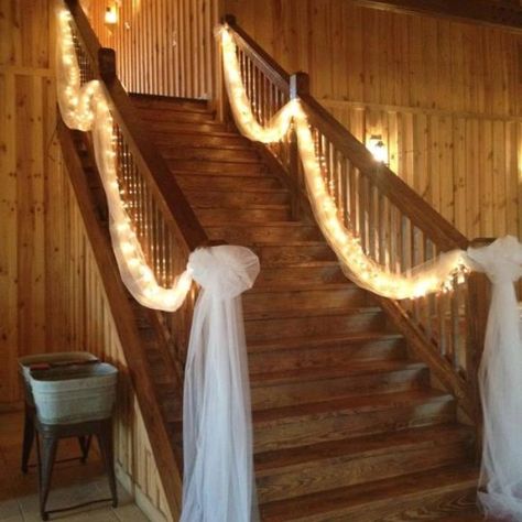 Stairway with Tulle..but we likely won't need the lights since it will be overly bright. Wedding Staircase Decoration, Wedding Stairs, Wedding Staircase, Staircase Decor Ideas, Stairway Decorating, Prom Decor, Staircase Decor, Stair Decor, Indoor Wedding