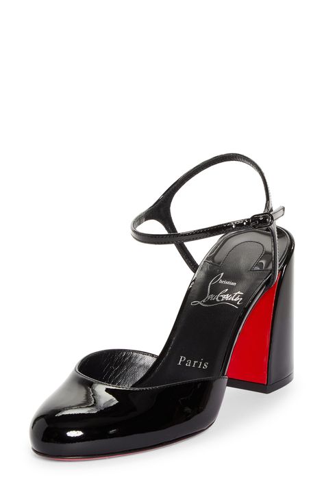 A rounded toe balances the bold, architectural heel of this patent-leather quarter-strap pump grounded by that iconic Louboutin-red sole. 3 1/4" (85mm) heel Adjustable strap with buckle closure Wipe with a soft, dry cloth and store in a dust bag Please note the red lacquer on soles will wear off as a result of normal use. To minimize the effect, avoid wearing in wet weather or on abrasive surfaces Leather upper, lining and sole Made in Italy Designer Shoes Unrealistic Wishlist, Shopping Addict, Red Louboutin, Louboutin Heels, Red Lacquer, Strap Pumps, Red Sole, Wet Weather, Louboutin Shoes