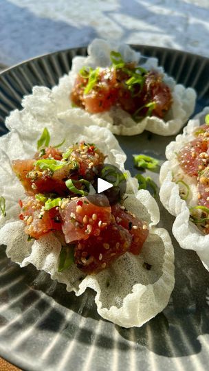 50K views · 2.1K reactions | Rice Paper Chips! ✨I could snack on these all day long - they’re really yummy and super fun to make! Rice paper is lightly fried then served with some poke 🍣 Get the recipe below‼️

INGREDIENTS 🐟 
Rice paper, cut into quarters
Poke, store-bought or homemade
Neutral oil, for frying
Green onion, garnish
Furikake, garnish 

INSTRUCTIONS 📝 
Cut rice paper into quarters and add to hot oil. The oil should be hot enough as the rice paper will crisp up within seconds. Remove from oil shaking off any excess and place onto a paper towel. Top with your fav poke and garnish with green onion & furikake. Enjoy! 

#crispyricepaper #crispyrice #crispyricechips #ricepaperchips #poke #snackideas #asianappetizer #ricepaper #ahitunapoke #asiansnack | steph🍴easy meals + snacks Frying Rice Paper, Fried Rice Paper Chips, Fried Rice Paper Recipes, Rice Paper Chips, Fried Rice Paper, Rice Paper Recipes, Ahi Tuna Poke, Asian Appetizers, Asian Dinner Recipes