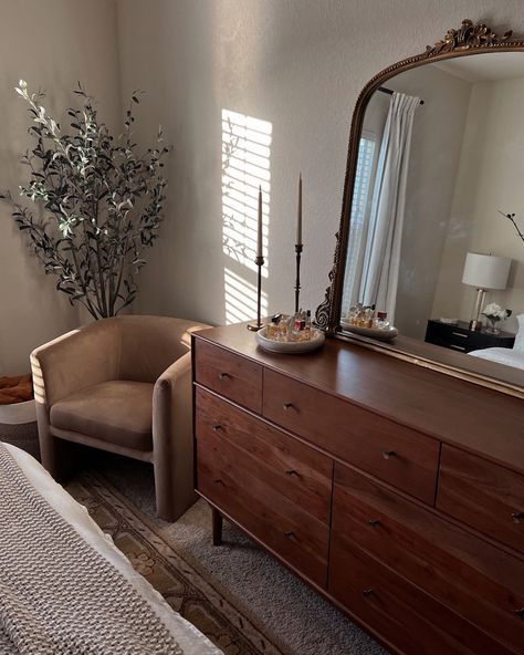 Dark Oak Dresser Bedroom, Arch Mirror Above Dresser, Large Dresser Decor, Chair Next To Dresser, Jewelry On Dresser Top, Dresser Decor Mirror, Dressers With A Mirror, Cozy Bedroom Dresser, Nightstand Dresser Combo