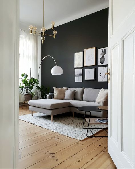 A Lovely, Understated, Warm and Inviting Berlin Home Gray Rug Living Room, Feature Wall Living Room, Dark Grey Walls, Minimalist Living Room Decor, Small Living Room Design, Trendy Living Rooms, Living Room Scandinavian, Living Room Inspo, Living Room Grey