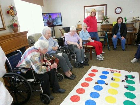 Beanbag Twister Toss. Have residents spin to determine the color the beanbag toss must land on. There are variations of this game. Can have circles identifying random objects or places of interest. The residents attempt to get the correct answer by landing near or on the correct circle.   Credit: https://www.pinterest.com/pin/50243352066136314/  the pin feature failed to locate thru the URL. Fun Activities For Seniors, Assisted Living Activities, Memory Care Activities, Activities For Seniors, Senior Living Activities, Preschool Craft Activities, Nursing Home Activities, Therapeutic Recreation, Alzheimers Activities