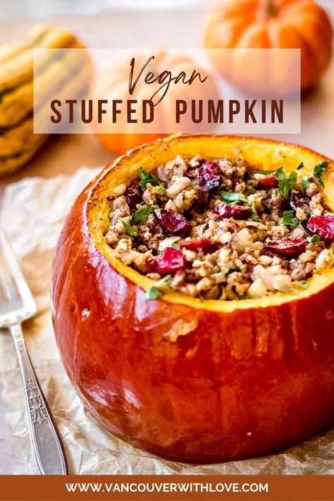 Bright orange vegan stuffed pumpkin filled with brown rice, cranberries and pecans. There are small decorative squash in the background. Stuffed Pumpkin Recipes, Thanksgiving Vegan, Stuffed Pumpkin, Pumpkin Syrup, Pumpkin Dishes, Vegan Rice, Pumpkin Recipe, Thanksgiving Recipe, Vegan Thanksgiving