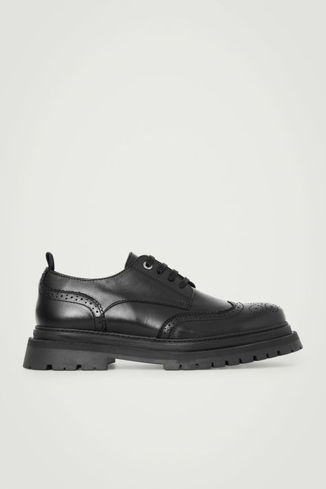 Crafted from polished chrome-free leather, these shoes marry the classic Derby shape with chunky soles for contemporary appeal. They're threaded with waxed-cotton laces and finished with hand-stitched apron trims and a perforated pattern at the toes that's signature to brogues. Lace-up closureCOS supports responsible manufacturing via the Leather Working Group  Upper & lining: 100% Leather. Sole: 100% Thermoplastic rubber. Excluding trims Cashmere Coat, Quilted Bag, Waxed Cotton, Trouser Jeans, Cotton Lace, Leather Working, Blouse And Skirt, Derby, Winter Outfits