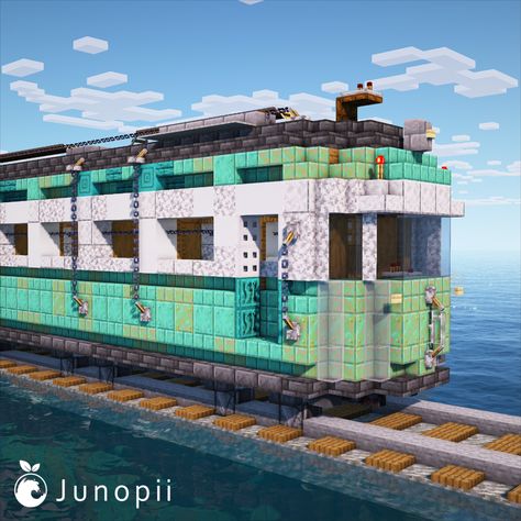 Minecraft build of a turquoise colored Japanese retro train car in the middle of the ocean. Totoro Minecraft Build, Minecraft Train Tunnel, Minecraft Train Design, Minecraft Ghibli Builds, Minecraft Steam Train, Minecraft Monorail, Tokyo Minecraft, Minecraft Caravan, Studio Ghibli Minecraft