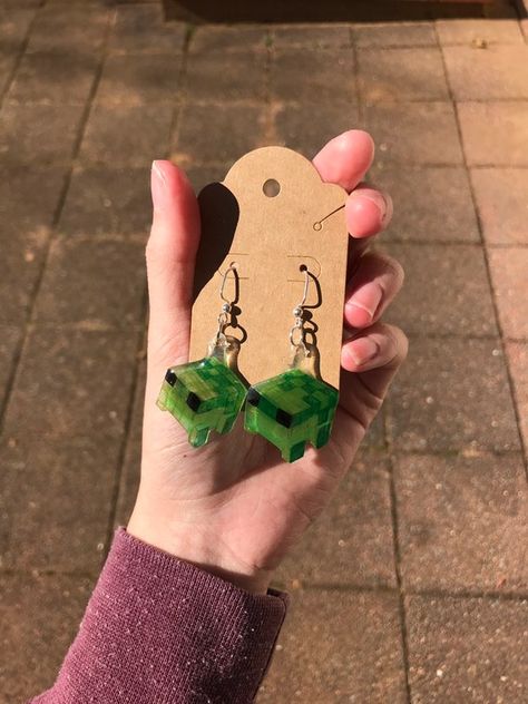 Minecraft Frog Earrings | Etsy Minecraft Frog, Frog Earrings, Frog Wallpaper, Frog Pictures, Weird Jewelry, Frog Art, Funky Earrings, Frog And Toad, Funky Jewelry