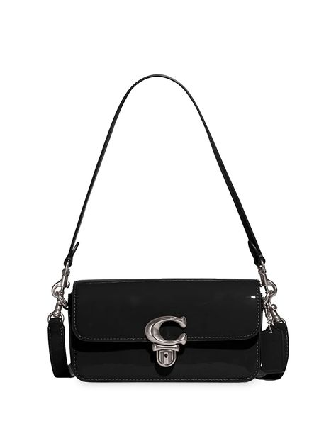 Shop COACH Patent Leather Studio Baguette Bag | Saks Fifth Avenue Coach Shoulder Bags, Leather Studio, Studio Bag, Patent Leather Bag, Pocket Logo, Coach Shoulder Bag, Baguette Bag, Black Shoulder Bag, Coach Leather