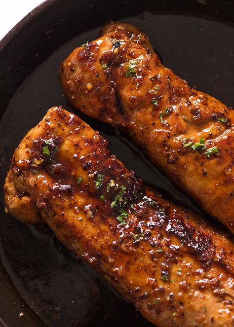 Overhead photo of two Honey Garlic Pork Tenderloin in a black skillet, fresh out of the oven Pork Tenderloin Recipes In Cast Iron Skillet, Cast Iron Pork Tenderloin, Pork Tenderloin Cast Iron Skillet, Pork Tenderloin Recipes Cast Iron, Pork Fillet Recipes Tenderloin, Recipe Tin Eats Recipes, Pork Tenderloin Recipes In Oven, Honey Garlic Pork Tenderloin, Pork Fillet Recipes