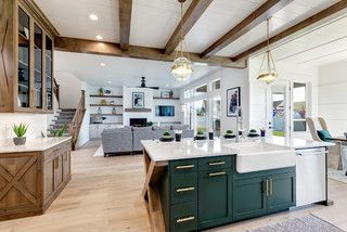 Check out this gorgeous modern farmhouse kitchen designed by Solitude Homes.  Emerald Green kitchen island with rustic ceiling beams, open concept living and breakfast nook.  #modernfarmhousekitchen #kitchenislandideas #modernfarmhousekitchenideas #greendecorideas #openconceptlivingideas Rustic Ceiling Beams, Green Kitchen Island, European Kitchen Cabinets, Rustic Ceiling, Farmhouse Kitchen Design, Modern Farmhouse Design, Modern Farmhouse Kitchens, Modern Farmhouse Decor, Farmhouse Style House