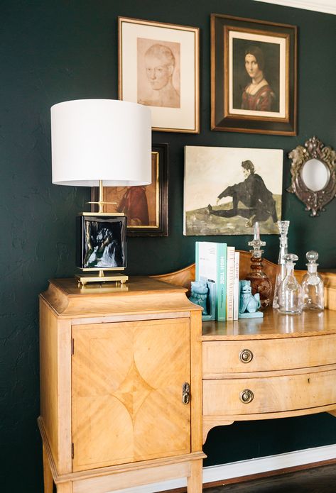 This family collected a variety of eclectic, vintage, and antique pieces to create a home bar they love. The use of a vintage buffet table increases the space and opportunities for unique decor. We completed the design of the space with gorgeous black table lamps and a gorgeous gallery wall as a backdrop for the bar. Vintage Buffet Table, Home Buffet, Vintage Gallery Wall, Gallery Wall Layout, Vintage Gallery, Vintage Buffet, Wall Inspiration, Dining Design, Gallery Wall Inspiration