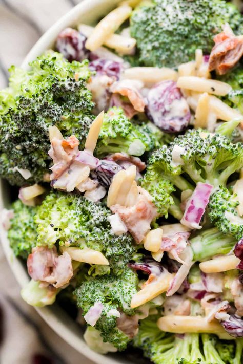 This classic Broccoli Crunch Salad recipe is an easy side dish that comes together in less than 15 minutes. It's made with crunchy broccoli, bacon, dried cranberries, almonds and a creamy homemade dressing. Broccoli Crunch Salad Recipes, Broccoli Salad Dressing Recipe, Brocoli Salad Recipes, Crunchy Salad Recipes, Broccoli Salad Dressing, Brócoli Salad, Broccoli Crunch Salad, Raw Broccoli Salad, Crunchy Broccoli