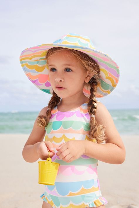 Keep them protected on the beach with our cute swim hat. Designed with a wide brim and made from a lightweight material, this summer staple will be a firm favourite for your little one. Matching swimwear is also available. Main 82% Recycled polyester, 18% Elastane. Lining 92% Recycled polyester, 8% Elastane. Swimwear Inspiration, Kids Swim, Summer 2025, Matching Swimwear, Beach Kids, Kids Swimwear, Kids Swimming, Summer Staples, Peter Parker