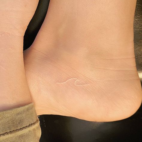 White Ink Wave Tattoo, White Ink Minimalist Tattoo, White Wave Tattoo, White Tattoo Small, White Minimalist Tattoo, Wave Foot Tattoo, Small White Ink Tattoo, Wave Tattoo Minimalist, Tiny Wave Tattoo