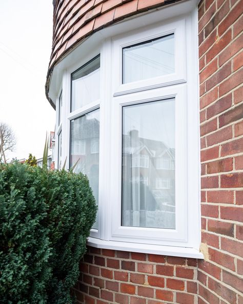 An exterior view of renovated curved UPVC bay window Bay Window Exterior, 1930s Living Room, 1930s House Renovation, Bedroom Bay Window, Window Exterior, House Renovation Projects, Window Company, 1930s House, Bay Windows