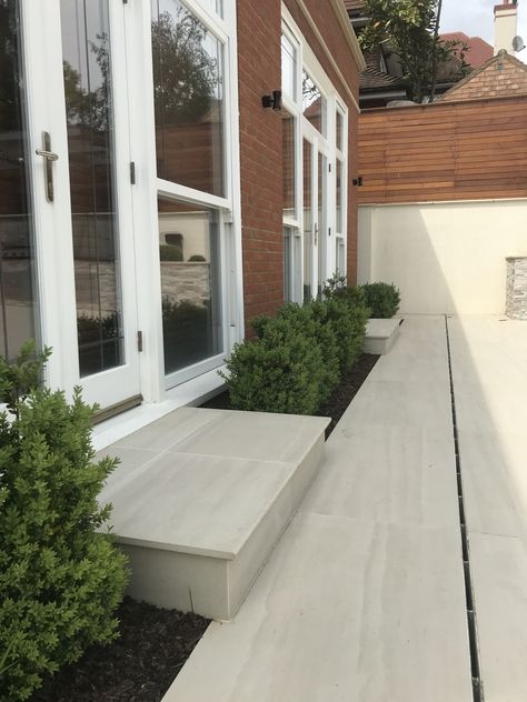 London Stone Faro Porcelain slabs with bullnosed steps and discreet slot drain London Stone, Bullnose Steps, Porcelain Front Door Step, Porcelain Patio Edging Ideas, Porcelain Steps Garden, Slabbed Front Door Step, Grey Slabs With White Stones Garden, Garden Sandstone Paving, Serenity Garden