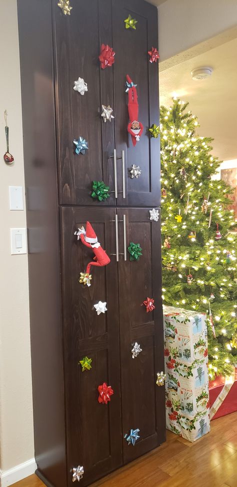 Christmas bow climbing 🎄 Elf Climbing On Bows, Elf On The Shelf Climbing Bows, Gum Drops, Christmas Bow, Christmas Bows, Deck The Halls, On The Shelf, Elf On The Shelf, Twinkle Twinkle