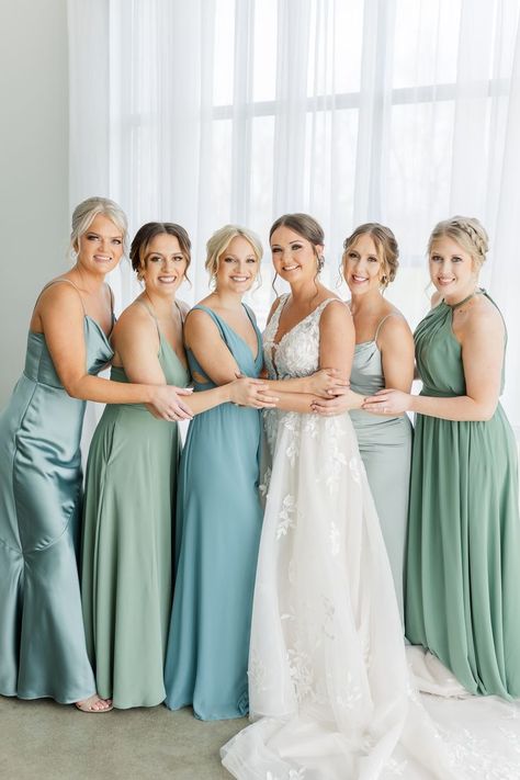 Mismatched bridesmaid dresses in blue and green tones, blue bridesmaids dresses, aqua bridesmaids dresses, green bridesmaids dresses, bride with bridesmaids in multiple color bridesmaid dresses Teal Wedding Bridesmaid Dresses, Mint Blue Bridesmaid Dresses, Blue Teal Bridesmaid Dresses, Shades Of Teal Bridesmaid Dresses, Bridesmaids Dresses Turquoise, Blue Green Dress Bridesmaid, Seafoam Bridesmaids Dresses, Bridesmaid Dresses Blue Green, Hues Of Blue Bridesmaid Dresses