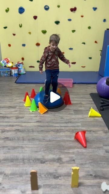 More Than A Gym on Instagram: "A body activity for single leg stance balance to kick over the cone, squat for lower extremity strength, and balance on the uneven surface when throwing the bean bags!  #morethanagym #pediatricpt #pediatricphysicaltherapist #pediatricphysicaltherapy #physicaltherapy #balance #bosu #bosuballworkout #bosuball #kidsactivities #kidsactivity #childdevelopment #motorcontrol" Balance Activities For Kids, Grandchildren Activities, Bosu Ball Workout, Toddler Gym, Occupational Therapy Kids, Pediatric Physical Therapy, Occupational Therapy Activities, Bosu Ball, Physical Activities For Kids