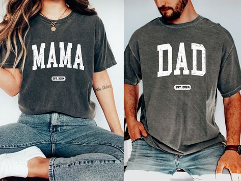 "FREE SHIPPING IN THE US! No order minimum!  Comfort Colors, Mama Established 2024 Shirt, New Dad Shirt, Gift for New Mom, Pregnancy Announcement Shirts, Mom Est 2024, Dad Est 2024 ♥ The SHIRT  * This is a Comfort Colors 1717 shirt.  * This unisex t-shirt is intended to be loose/oversized for women to give a chic and laid back vibe. If you are looking for an oversized \"T-shirt Dress\" look, we recommend sizing up 2-3 sizes.  * Detailed sizing information can be found in the size chart in the photos.  * Printed in the USA. ♥ CARE  ＊Machine wash cold, inside-out, gentle cycle ＊Wash with mild detergent and similar colors ＊Tumble dry low or hang-dry ＊Do not bleach or fabric softeners ＊Do not iron directly onto the design ＊Do not dry clean ♥ PRODUCTION & SHIPPING ＊Each shirt is made to order. Dad Established Shirt, Mom Est 2023, Dad To Be Shirt, Matching Mom And Dad Shirts, Mom And Dad To Be Shirts, Mom Established Shirt, Mom And Dad Sweatshirts, Mom And Dad Shirts Pregnancy, Mommy To Be Shirts