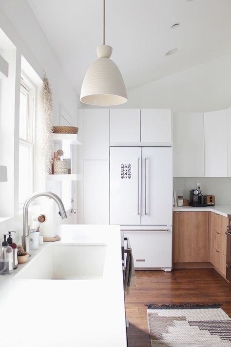 our kitchen : the reveal - almost makes perfect Medeteranian Kitchen, Neutral Kitchen Designs, White Fridge, Kitchen Pendant Lights, Beautiful White Kitchens, Modern Renovation, Neutral Kitchen, Kitchen Pendant, Rustic Kitchen Design