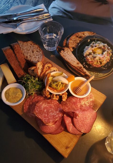 A charcuterie board with various meats and cheese with beef tartare in the back. Beef Tartare, Food Recommendations, Aesthetic Dinner, Toronto Food, Toronto Restaurants, Photo Insta, Charcuterie Board, Happy Hour, My Heart