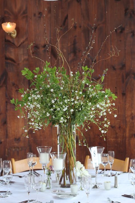 Eucalyptus Arrangement Vase Wedding, Tall Vase Table Centerpieces, Foliage Centerpiece Wedding, Greenery And Babysbreath Centerpiece, Tall Greenery Centerpieces, Fern Centerpiece Wedding, Fern Centerpiece, Tall Flower Centerpieces, Branches Wedding Decor