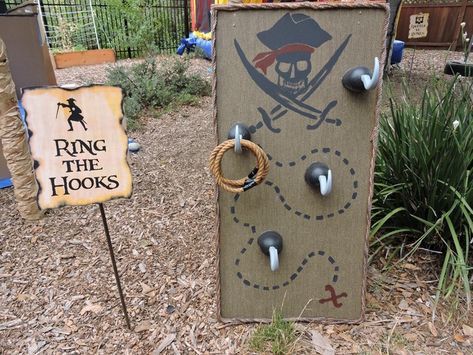 Pirate game idea on Halloween forum Pirate Ring Toss, Goonies Birthday Party, Backyard Fun Ideas, Pirate Games For Kids, Goonies Birthday, Goonies Party, Pirate Halloween Decorations, Pirate Party Games, Fun Ideas For Kids