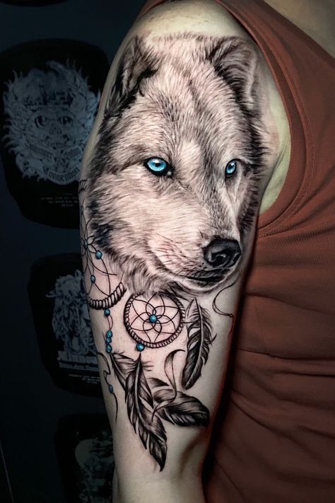 Wolf tattoo by Stefan, limited availability at Revival Tattoo Studio Indian Arrow Tattoo, Wolf Dreamcatcher Tattoo, Atrapasueños Tattoo, Indian Girl Tattoos, Wolf Tattoos For Women, Holy Spirit Tattoo, Holy Trinity Tattoo, Trinity Tattoo, Indian Feather Tattoos