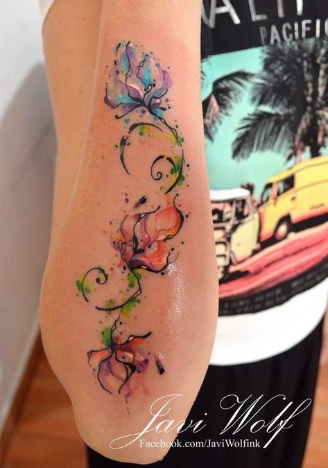 Flowers decorate this girls arm from wrist to elbow in a watercolor tattoo by Javi Wolf Watercolour Tattoos, Watercolor Tattoo Flower, Muster Tattoos, Watercolor Tattoos, Vine Tattoos, Geniale Tattoos, Wolf Tattoo, Pattern Tattoo, Disney Tattoos