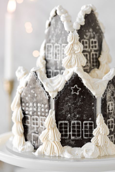 Make your own gingerbread village cake for Christmas by pressing iced chocolate shortbread house cookies around a cake, and decorating with vanilla buttercream Christmas trees and swirling snow drifts. This makes a fun holiday baking project for a snowy weekend at home! Iced Chocolate, Christmas Cookie Box, Chocolate Shortbread, Chocolate Shortbread Cookies, Champagne Cake, Delicious Christmas Cookies, Gingerbread Village, Winter Cake, Gingerbread Cake