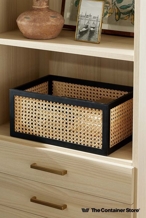 Blending sustainable materials with easy functionality, our own designers collaborated with skilled artisans to create these versatile utility bins. They're crafted by hand of pine with cane-woven rattan in a radial pattern for natural sturdiness. Shelf-friendly dimensions work in a closet, home office or media center. Or choose one as a sophisticated catchall for books, toys and remotes. Aesthetic Storage Bins, Cane Storage Baskets, Container Store Ideas, Cane Boxes, Cane Storage Box, Peach Packaging, Wood And Cane Shelf, Rattan Boxes Storage, Clear Shoe Boxes