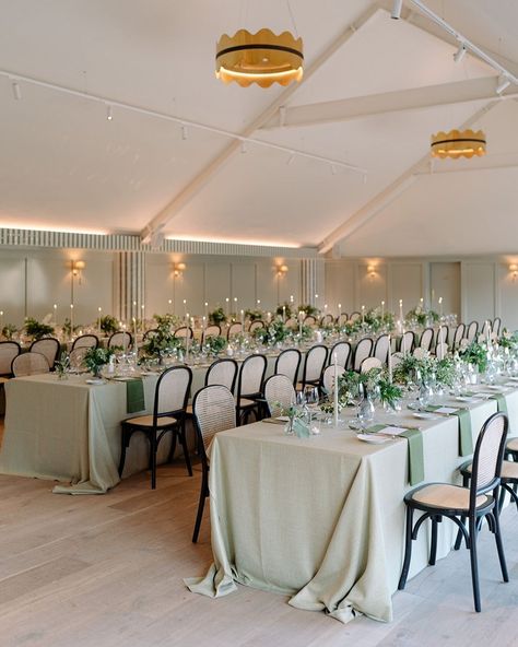 Modern, stylish tablescape styling including sage green tablecloths and napkins, greenery and candlelight. At unique, refurbished Wiltshire venue, Kin House. Sage Green Tablecloth Wedding, Kin House Wiltshire, Sage Green Table Cloth, Green Tablecloth Wedding, Kin House, Green Table Settings, Bridal Dressing Room, Green Tablescape, Wedding Reception Hall