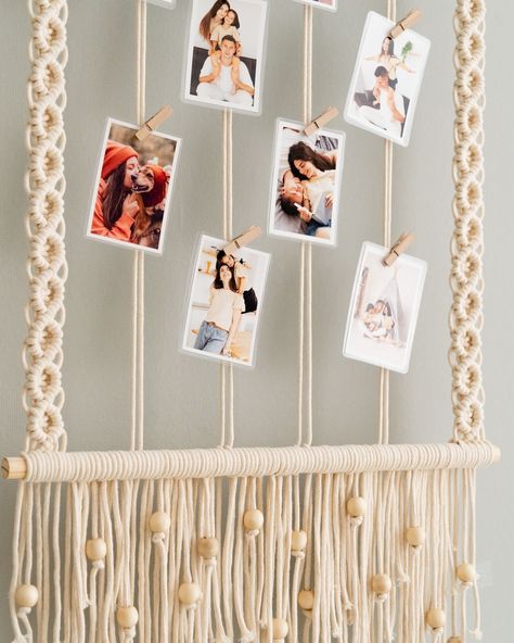 Are you looking to elevate your living space with contemporary wall decor or searching for a unique gift? Our Macrame Photo Holder is the perfect choice. Want to know more? The link's in our bio or send us a message. #bohogifts #handcraftedart #bohohomes #wallhangingart #macramewallhanging #macramestyle #handmadehomegoods #homegift #macramehandmade #macramedecoration #lovemacrame #bohowallhanging #homedecoration #decorateyourhome #handmadelovers Macrame Photo Holder, Macrame Wall Hanger, Macrame Knots Tutorial, Christmas Organization, Diy Boho, Photo Holder, Boho Wall Hanging, Boho Macrame, Handcrafted Art