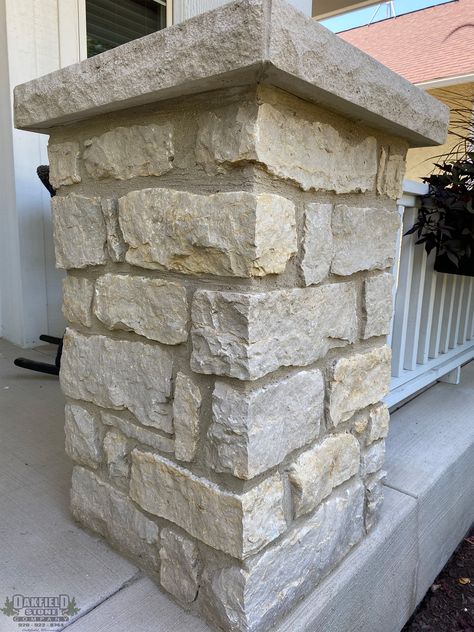 Oakfield Stone's Prairie Stonegate 100% splitface, machine cut veneer. This ashlar natural stone is a dolomitic limestone quarried by Oakfield Stone Company near Beaver Dam, Wisconsin. The primary color is a buff, light tan and brown with occasional light blue/gray course layers. Rock Pillars Columns, Stone Pillars Driveway Entrance, Stone Pillars Porch, Outdoor Pillars, Stone Pillars Columns, Porch Post Ideas, Diy Stone Veneer, House Pillars, Foto Iphone