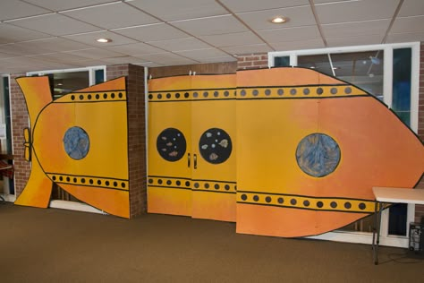 Fun submarine decorating idea for Ocean Commotion VBS 2016 Submarine Classroom Door, Submarine Bulletin Board Ideas, Submarine Decor, Submerged Vbs Decorations, Deep Sea Discovery Vbs, Ocean Commotion Vbs, Vbs Ocean Theme, Ocean Commotion, Submerged Vbs