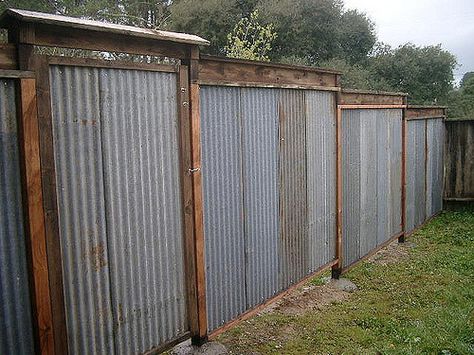 East Side with Japanese Style Roof over gate.  GoldRidge Sangha KTP Privacy Fence 90% on site reclaimed material | by Lushplanet Corrugated Metal Fence, Metal Fences, Metal Fence Panels, Corrugated Tin, Privacy Fence Designs, Cheap Backyard, Backyard Privacy, Steel Fence, Diy Fence