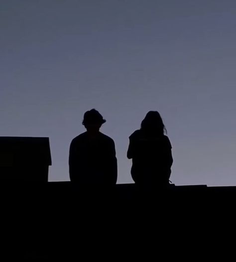 Couples On Rooftop At Night, Couple On Rooftop Aesthetic, Couple Sitting On Roof At Night, Roof Tops Aesthetic, Friends To Lovers Playlist Cover, Rooftop Couple Aesthetic, Roof Top Aesthetic Night, Rooftop At Night Aesthetic, Rooftop Stargazing Aesthetic