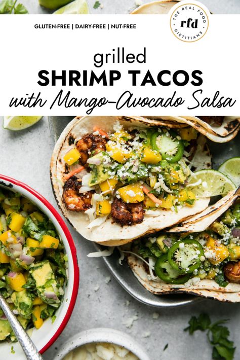 When it comes to dinners, these Grilled Shrimp Tacos are a must-try! Summertime grilling brings all the best flavors to the table. These shrimp tacos pack a little heat with ancho chili powder and cumin in the marinade but they're cooled down perfectly with a homemade chunky Mango Avocado Salsa. Grilled Shrimp Tacos Recipe, Grilled Shrimp Tacos, Spicy Shrimp Tacos, Shrimp Taco Recipes, Entree Dishes, Ancho Chili Powder, Mango Avocado Salsa, Mango Avocado, Grilled Shrimp Recipes