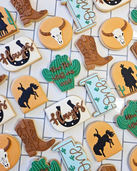 How the West was one 🌵🐎 . . . #howthewestwasone #cowboycookies #westerncookies #cactuscookies #birthdaycookies #cookies #cookie #cookieart #cookiesofinstagram #cookiestagram #cookiedecorating #sugarcookiemarketing #sugarcookies #decoratedcookies #royalicing #royalicingcookies #yyc #calgary #yyclocal #yyceats #cochrane #cochraneloveslocal #cochranealberta #cochranebusiness #calgarycookies #cochranecookies #firstbirthdaycookies Bull Cookies Decorated, How The West Was One, First Birthday Cookies, Cowboy Cookies, Cowboy Design, Mexican Party, Cookie Art, Birthday Cookies, Royal Icing Cookies