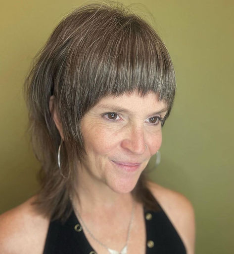 Shoulder-Length Shag with Graphic Fringe Mullet With Fringe Woman, Wolf Cut Older Women, Wide Bangs Hair, Shag Mullet Straight Hair, The Shag Haircut, Shag Haircuts For Women, Gray Shag, Very Short Bangs, Mullet Hairstyles