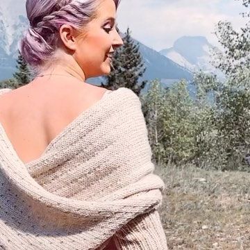 Knitatude | Chantal on Instagram: "It’s wedding day for @bizknits and I had to wear my #SnowfallSweaterScarf during the ceremony 🥰 Congrats Raemie & Wes 🙌🏼 . Ps, You can find the #SnowfallSweaterScarf pattern in my ravelry, Etsy and website shops 💜 (linked in my bio) . . . #sweaterscarf #scarfwithsleeves #thneed #weddingshawl #weddingscarf #weddingknit #weddingguest #mountainbride #canmore #knitatudeknits #lionbrandyarn #sharemylby #woolease #boutique1861 #boutique1861montreal" Disney Inspired Wedding, Wedding Scarf, Loom Knitting Projects, Mountain Bride, Wedding Shawl, Lion Brand Yarn, Wool Crafts, August 19, Felt Diy