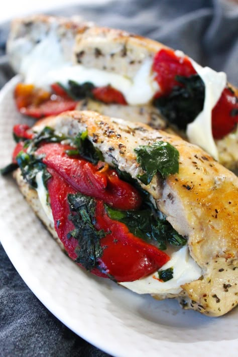 Roasted Red Pepper, Spinach, and Mozzarella Stuffed Chicken Breast - Fit Mom Journey Roasted Red Pepper Spinach Stuffed Chicken, Spinach And Roasted Red Pepper Stuffed Chicken, Roasted Red Pepper Spinach Mozzarella Chicken, Roasted Red Pepper Stuffed Chicken Breast, Stuffed Chicken Breast With Roasted Red Peppers, Chicken Roasted Red Peppers Spinach, Chicken Roasted Red Peppers Mozzarella, What To Do With Roasted Red Peppers, Roasted Red Pepper Spinach Chicken