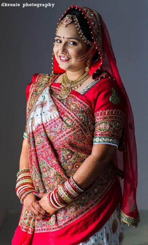 What can we say about a Gujarati bride- she is simple yet a natural charmer. Whether it is her graceful garba moves or her traditional white panetar, we are always in awe of a beautiful Gujarati bride. And when we talk about a Gujarati wedding, it is Gujarati Bride, Headshot Portrait, Gujarati Wedding, Fashion Professional, Saree Draping, Bride Fashion, Indian Bridal Dress, Indian Bridal Wear, Wedding Saree Indian