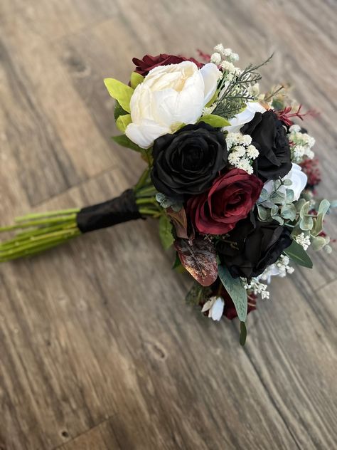 Wedding bouquet, Burgundy black bouquet, bridal bouquet, Bridesmaid bouquet, Silk flowers, Boho wedding bouquet Featured colors: burgundy, black, white and green Measurements: bride bouquet-14” in height Bridesmaids-10” in height Toss bouquet- 6” in height Made of all high quality artificial flowers If you love this bouquet but would like it in a different color, or there is something you want added, removed, please send us a message with the request and we will be happy to provide you with a qu Black White Burgundy Bouquet, Hoco Bouquet, Wedding Bouquet Black, Prom Flowers Bouquet, Bouquet Burgundy, Toss Bouquet, Bridal Bouquet Bridesmaid, Prom Bouquet, Dark Wedding Theme