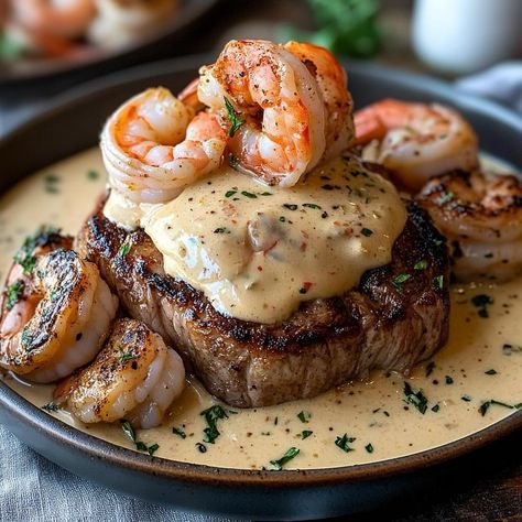 🍽️ Surf and Turf with Shrimp and Lobster Cream Sauce Ingredients For the Steak: 2 ribeye or filet mignon steaks (about 1-inch thick) 🥩 Salt and pepper, to taste 🧂 2 tablespoons olive oil 🫒 1 tablespoon butter 🧈 For the Lobster Cream Sauce: 1 cup cooked lobster meat, chopped 🦞 1/2 lb shrimp, peeled and deveined 🦐 1 cup heavy cream 🥛 1/2 cup lobster or seafood broth 🥣 2 tablespoons butter 🧈 2 cloves garlic, minced 🧄 1 teaspoon lemon juice 🍋 Salt and pepper, to taste 🧂 Fresh parsley, chopped (... Cooked Lobster, Lobster Cream Sauce, Lobster Sauce, Filet Mignon Steak, Steak And Shrimp, How To Cook Lobster, Lobster Meat, Surf And Turf, Cream Sauce