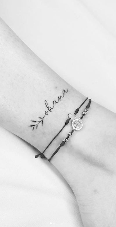 Ohana Symbol Tattoo, Simple Tattoos For Family Members, Simple Ohana Tattoo, Ohana Infinity Tattoo Ideas, Stitch Tattoo Ideas Small Ohana, Mother Daughter Ohana Tattoos, Ohana Tattoo Flower, Ohana Script Tattoo, Ohana Collar Bone Tattoo