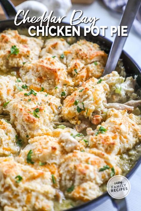 Easy comfort food! This Cheddar Bay Biscuit Chicken Pot Pie has the best combination of flavors! With a creamy chicken and veggie filling topped with cheesy biscuits, and cooked until bubbling and golden-lidded, it’s so delicious. With a couple of easy shortcuts, this homemade cheddar bay chicken pot pie takes only 20 minutes hands-on prep and 20 minutes to bake. This easy chicken pot pie recipe is perfect for busy weeknights and the whole family will love it! Cheddar Bay Chicken, Homemade Pot Pie, Biscuit Chicken Pot Pie, Cheesy Biscuits, Easy Chicken Pot Pie Recipe, Chicken Pot Pie Filling, Chicken Pot Pie Recipe, Pot Pie Filling, Cheddar Bay Biscuits