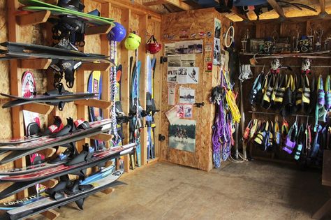 Lake Storage Shed, Boathouse Organization Ideas, Water Ski Storage Ideas, Lake Shed Organization, Water Ski Storage, Boat Dock Storage Ideas, Lake Storage Ideas, Life Jacket Storage Ideas, Life Jacket Storage